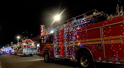 VIDEO: Christmas parade brings in big bucks and (mostly) rave reviews